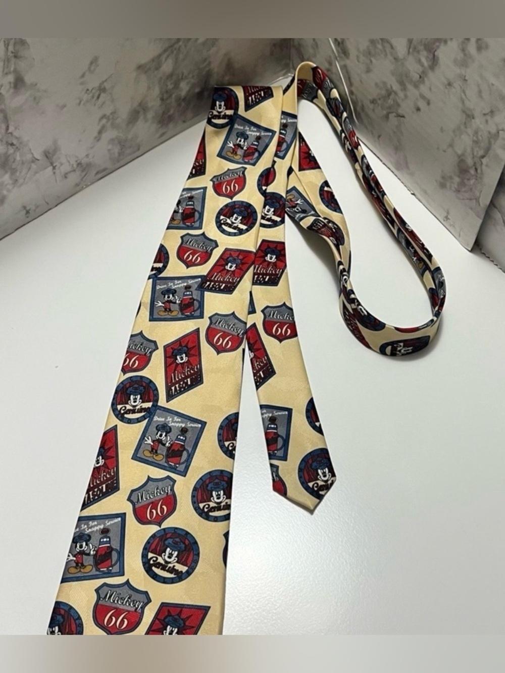 Mickey Unlimited Men's Beige Novelty Tie with Red & Blue Motifs